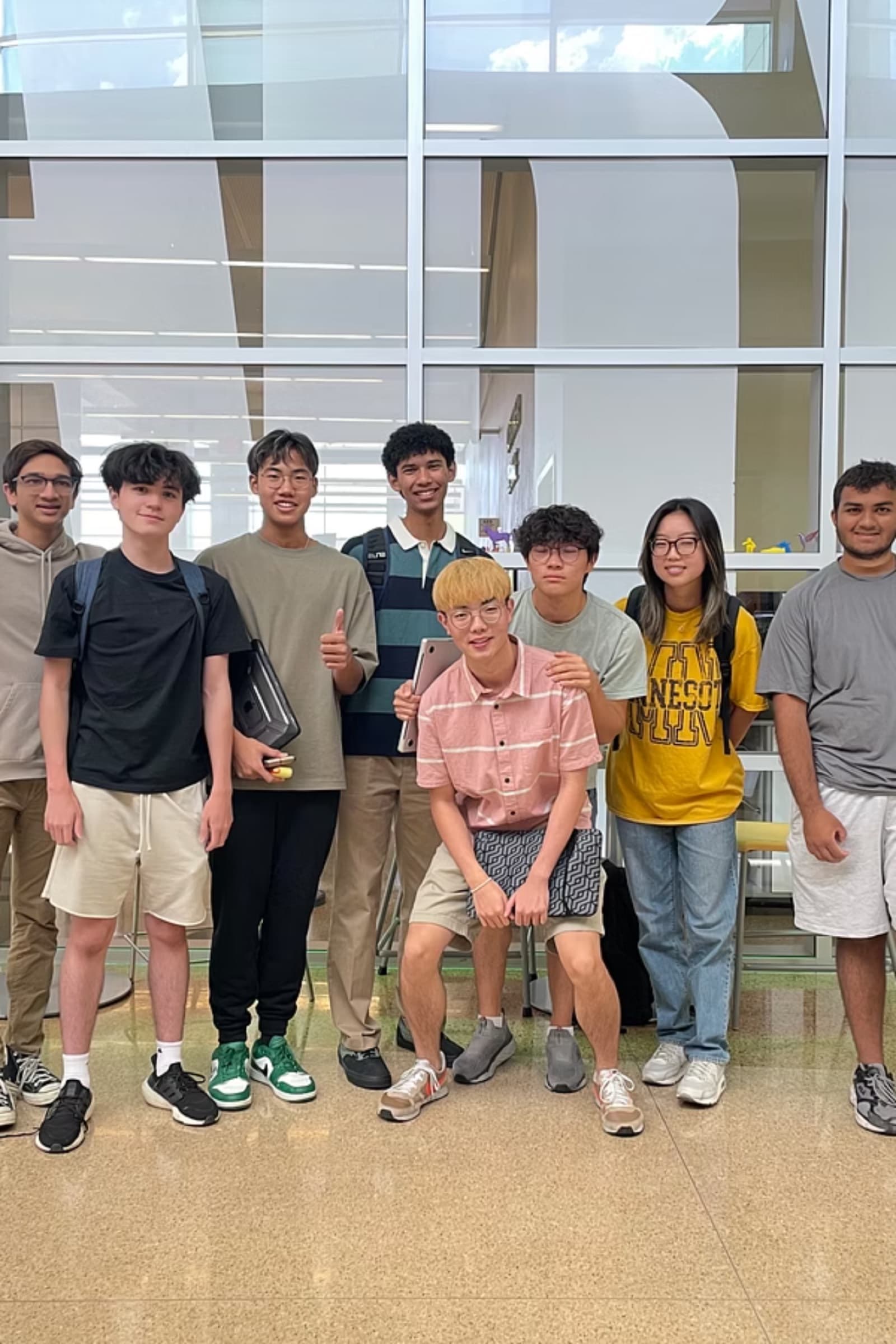 AIQ student tutors gathered before a tutoring session